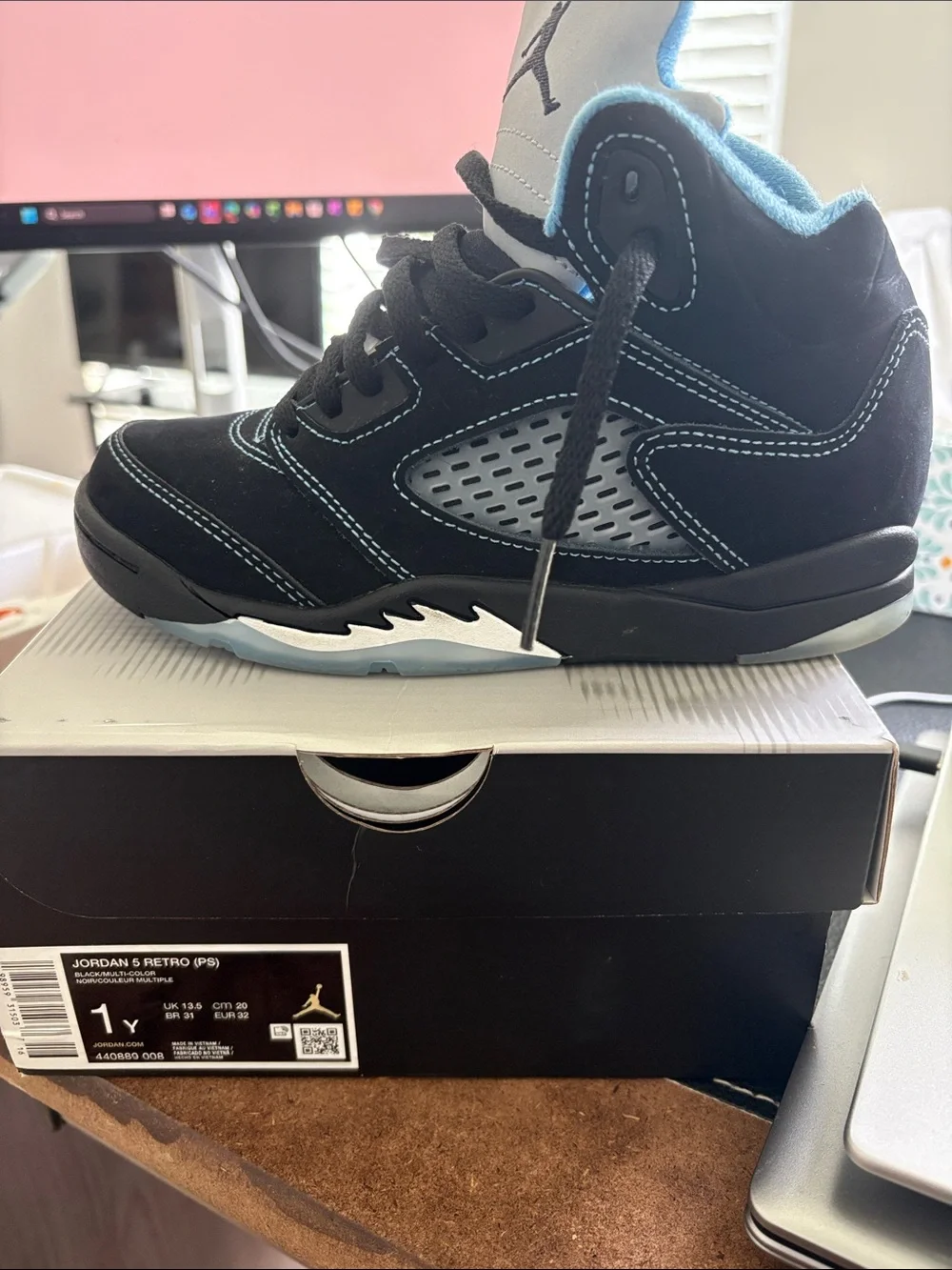 Jordan Retro Black with Light Blue Accent Sneakers